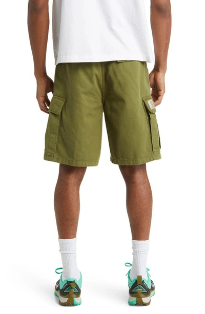 Shop Carhartt Cole Organic Cotton Moraga Twill Cargo Shorts In Kiwi Garment Dyed