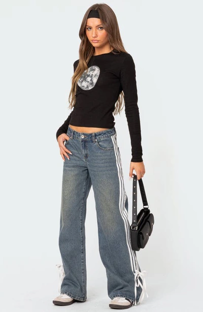 Shop Edikted Mattie Side Stripe Bow Low Rise Wide Leg Jeans In Blue-washed