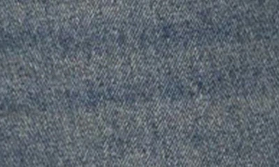 Edikted Mattie Side Stripe Bow Low Rise Wide Leg Jeans In Blue-washed