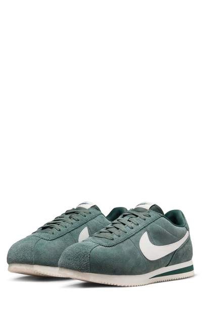 Shop Nike Cortez Sneaker In Vintage Green/ Sail/ Navy