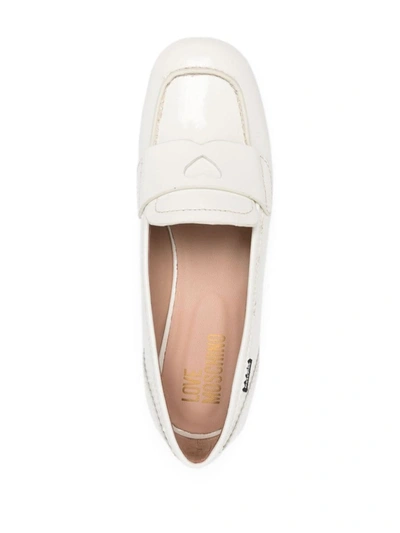 Shop Love Moschino Loafers With Logo Detail In White