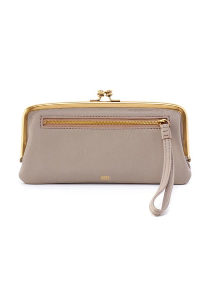 Shop Hobo Large Cora Leather Frame Clutch In Taupe