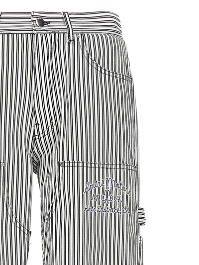 Shop Amiri 'motors Carpenter' Pants In White/black