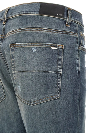 Shop Amiri 'fracutred' Jeans In Blue
