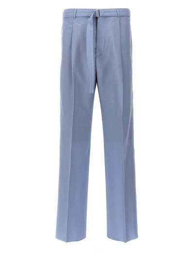 Shop Lanvin Front Pleat Pants In Blue