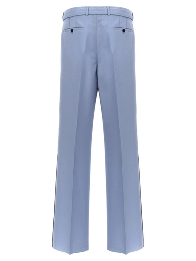 Shop Lanvin Front Pleat Pants In Blue