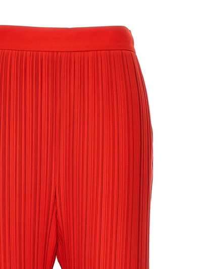 Shop Lanvin Pleated Pants In Red