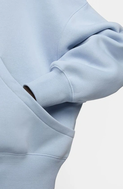Shop Nike Sportswear Phoenix Fleece Pullover Hoodie In Light Armory Blue/ Sail