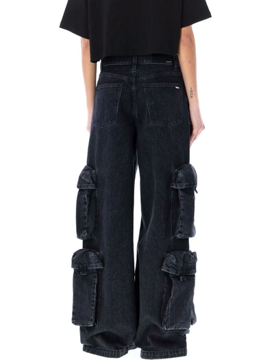 Shop Amiri Baggy Cargo Jeans In Faded Black