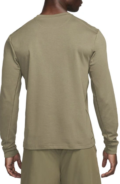 Shop Nike Dri-fit Primary Long Sleeve T-shirt In Medium Olive/ Medium Olive