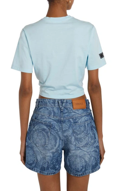 Shop Versace 1978 Re-edition Logo Safety Pin Crop Graphic T-shirt In Pale Blue/ Bianco