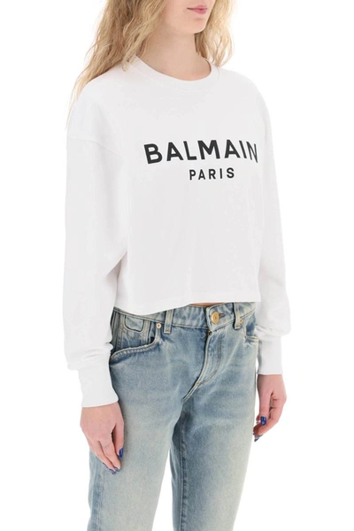 Shop Balmain Cropped Sweatshirt With Flocked Logo In White