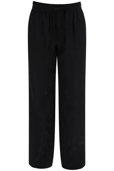 Shop Dolce & Gabbana Dg Jacquard Pants In Black