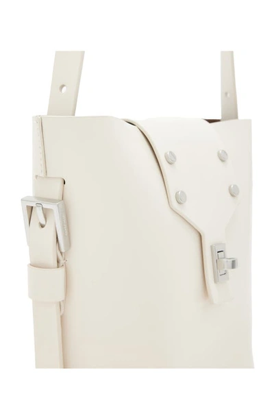 Shop Allsaints Miro Crossbody Bucket Bag In Desert White