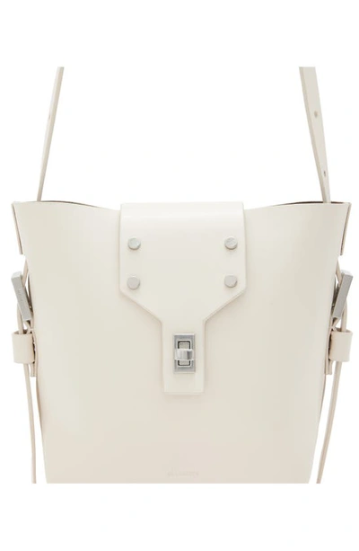 Shop Allsaints Miro Crossbody Bucket Bag In Desert White