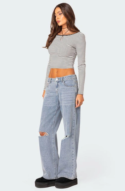 Shop Edikted Debbie Ripped Low Rise Wide Leg Jeans In Light-blue