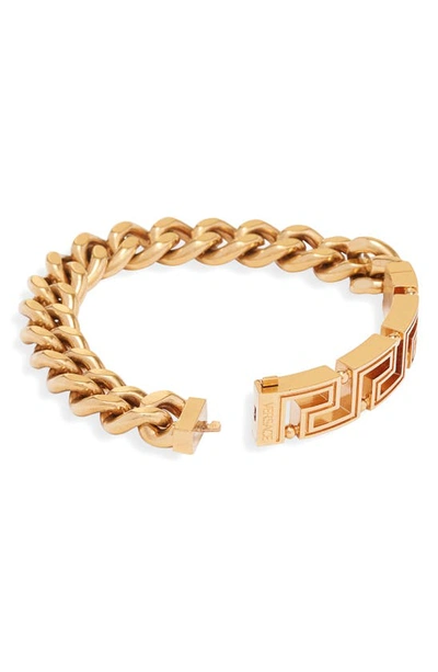Shop Versace Greca Chain Bracelet In  Gold