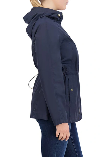 Shop Cole Haan Travel Packable Hooded Rain Jacket In Indigo