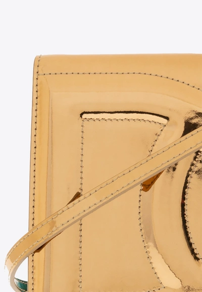 Shop Dolce & Gabbana 3d-effect Logo Metallic Crossbody Bag In Gold