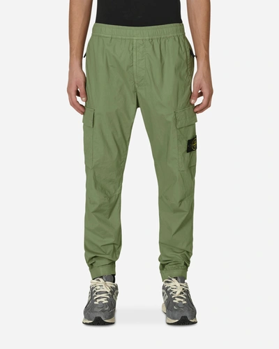Shop Stone Island Regular Tapered Trousers In Green