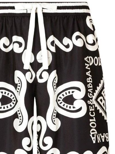 Shop Dolce & Gabbana Trousers In Dg Marina F. Blu