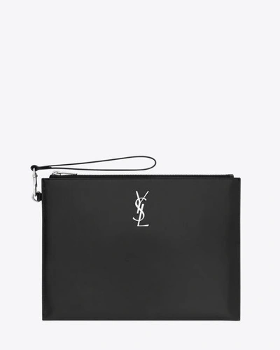 Shop Saint Laurent Logo Plaque Clutch Bag In Black