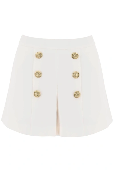 Shop Balmain Crepe Shorts With Embossed Buttons Women In White