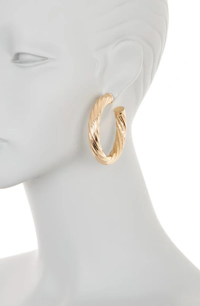 Shop Tasha Textured Hoop Earrings In Gold