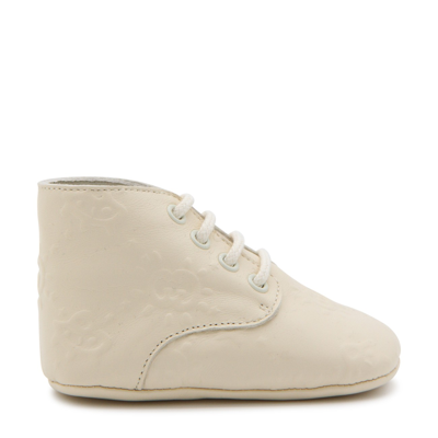 Shop Gucci Ivory Leather Ufo Gg Boots In Ivoire