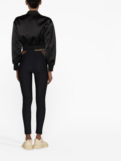 Shop Versace Greca Crossover Waistband Leggings In Black