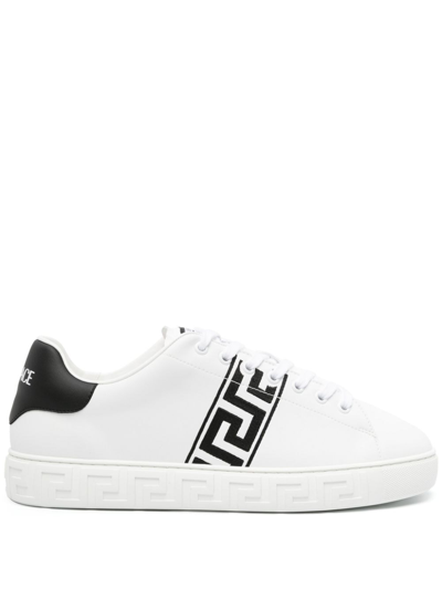 Shop Versace Greca Embroidered Sneakers In Black