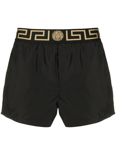 Shop Versace Greca Trim Swim Shorts In Black