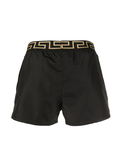 Shop Versace Greca Trim Swim Shorts In Black