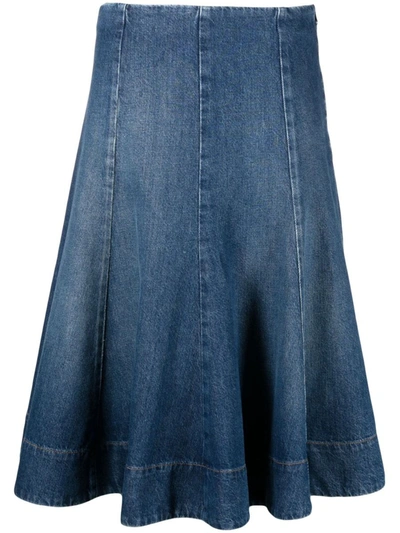 Shop Khaite Lennox Flared Denim Midi Skirt In Blue