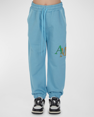 Shop Amiri Kid's Staggered Scribble Logo Sweatpants In Air Blue