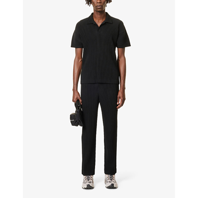 Shop Issey Miyake Pleated Regular-fit Knitted Polo Shirt In 15-black