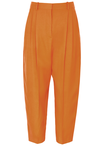 Shop Stella Mccartney Cropped Tapered Trousers In Orange