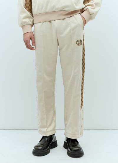 Shop Gucci Gg Track Pants In Beige