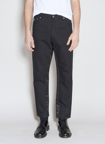 Shop Prada Logo Plaque Five-pocket Jeans In Black