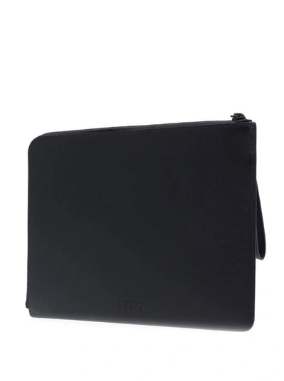 Shop Kenzo Black Clutch Bag With Logo Patch And Wrist Strap In Leather Man