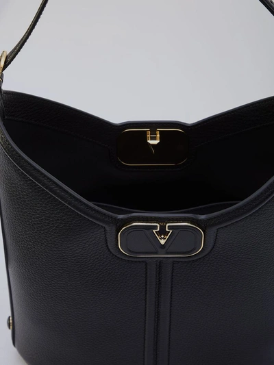 Shop Valentino Vlogo Leather Hobo Bag In Black