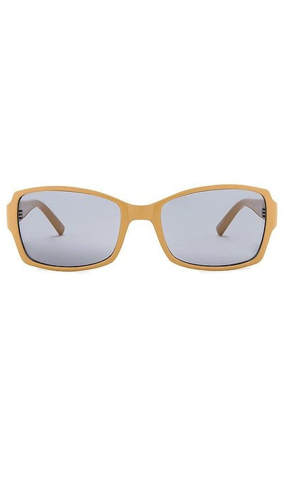 Shop Le Specs Trance In Mustard Putty