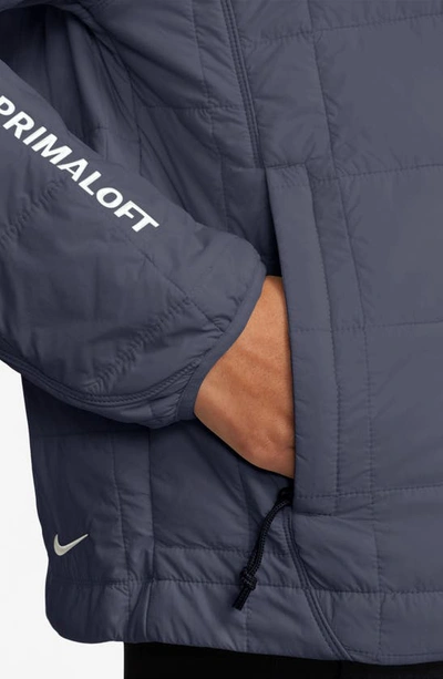 Shop Nike Acg Therma-fit Adv Quilted Insulated Jacket In Thunder Blue/ Summit White