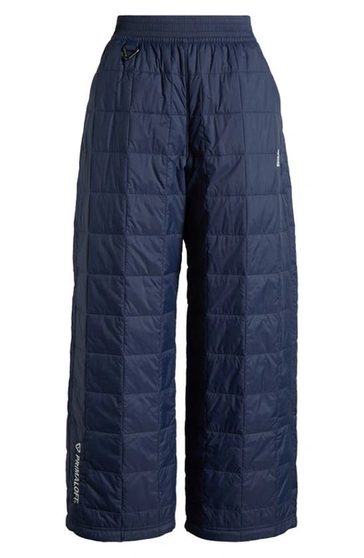Shop Nike Acg Therma-fit Adv Quilted Insulated Wide Leg Pants In Thunder Blue/ Summit White