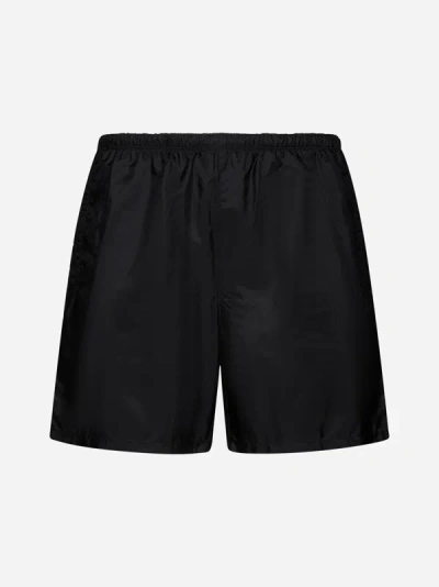 Shop Prada Re-nylon Swim Shorts In Black