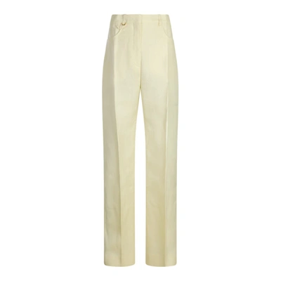 Shop Jacquemus Trousers In Pale Yellow