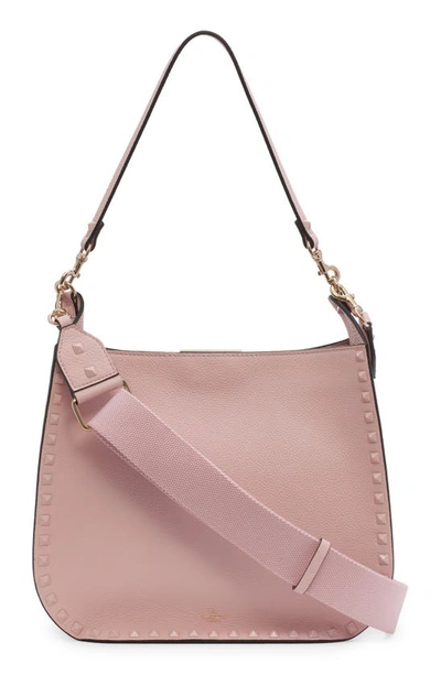 Shop Valentino Rockstud Leather Hobo Bag In 16q Rose Quartz