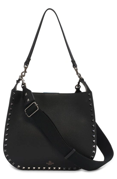 Shop Valentino Rockstud Leather Hobo Bag In 0no Nero
