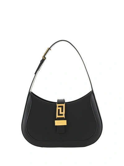 Shop Versace Greca Goddess Handbags In Black- Gold