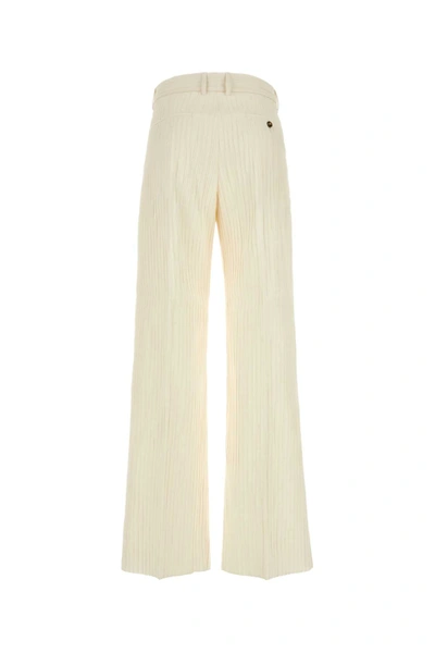 Shop Amiri Pants In White